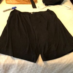 Black shorts.   Links.   Size M